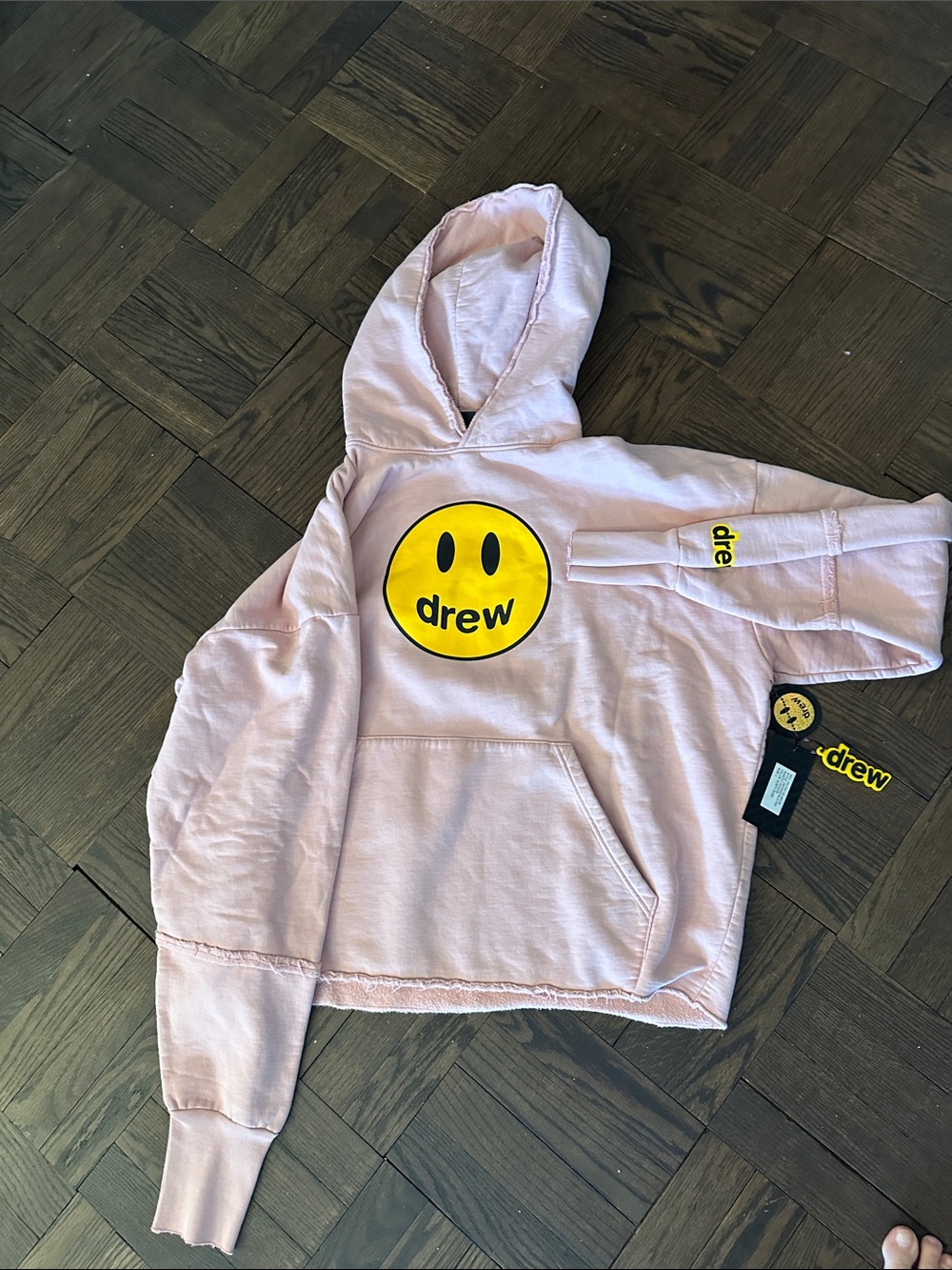 DREW Pink Hoodie with Yellow Smiley Logo